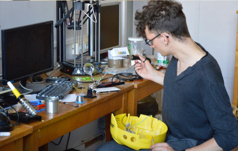 A younger Paul soldering the insides of Kärl's head